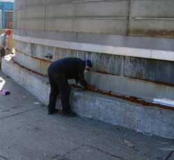 Laying up the Zinc Tape on a prepared section.